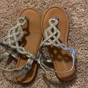 A pair of cat and Jack glamorous kids sandals